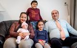 De familie Mekhaeel, met dochter Joya tussen vader Maged en moeder Janet Saad. De twee maanden oude Joélla zit op schoot, zoon Manuel staat achter zijn ouders.