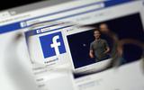 Een blik op de website van Facebook, met oprichter Mark Zuckerberg in beeld.
