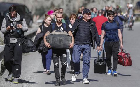 Russische mannen die niet willen opgeroepen voor de oorlog in Oekraïne ontvluchten hun land. 