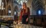 Janneke Heijenga brandt een kaarsje in de Sint-Martinuskerk in Sneek. 