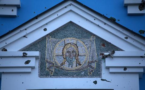 Kogelgaten in een kerk in de regio Donetsk. 