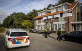 Politie doet onderzoek op het terrein van het Albergse 'asielhotel' 't Elshuis waar in de nacht van zondag op maandag brand heeft gewoed. 