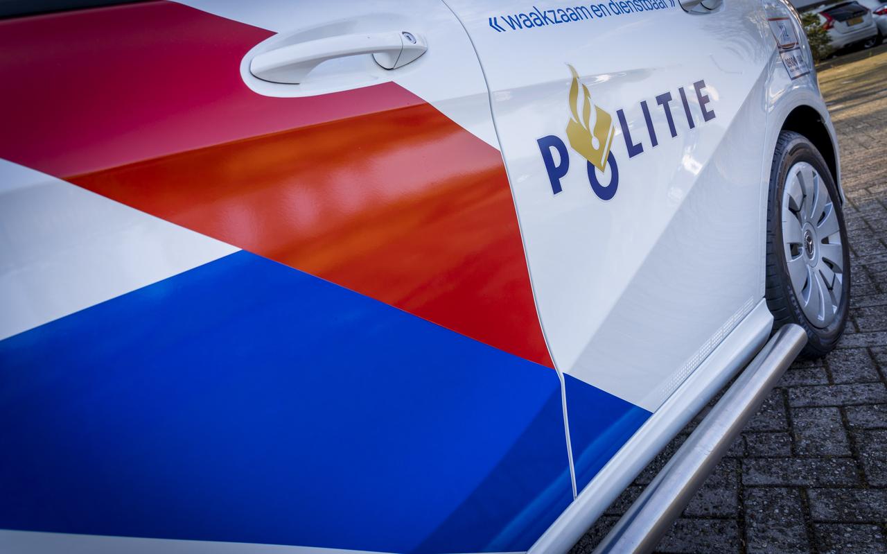 Zijkant van een politieauto. Zijkant van een politieauto.