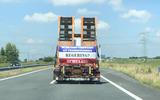 Met vrachtwagens vol leuzen tegen het kabinet Rutte, rijden actievoerders Leeuwarden binnen. 