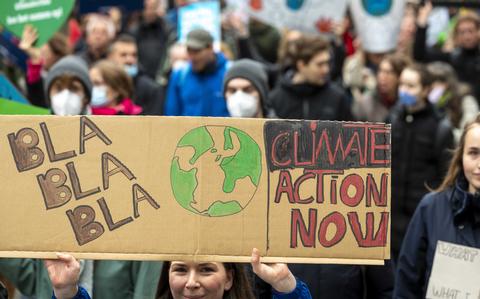 Actievoerders tijdens de Klimaatmars in Amsterdam.