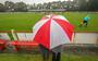 Regen in Fryslân. Regen bij Jubbega - WVV. De clubparaplu van Jubbega biedt uitkomst