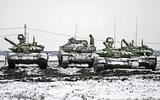 Vier Russische tanks op een oefenterrein in de regio Rostov, op een kleine honderd kilometer van de grens met Oekraïne.