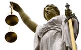 Een beeld van Vrouwe Justitia. 